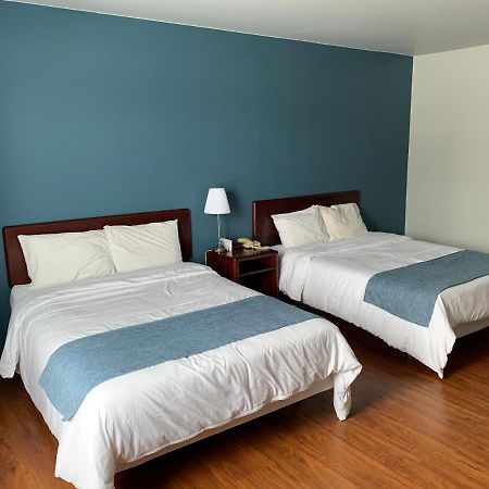 Motel Le Rond Point Metabetchouan 外观 照片
