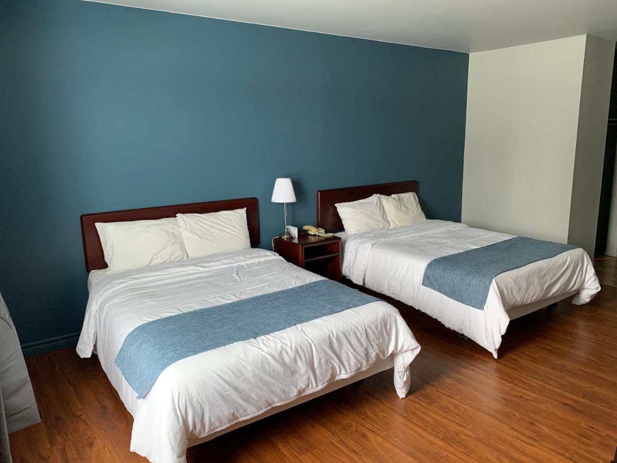 Motel Le Rond Point Metabetchouan 外观 照片